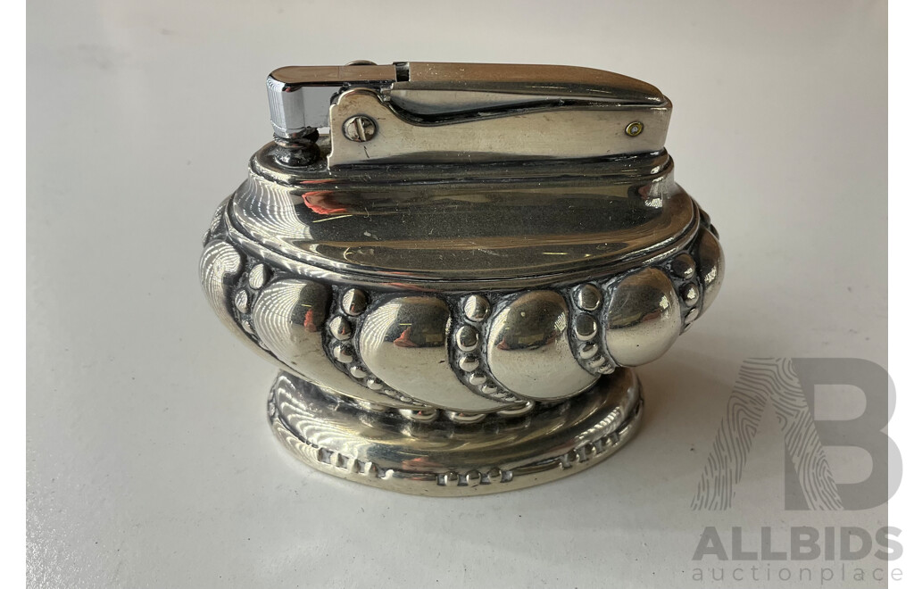Collection of White Metal and Silver Plated Collectables, Including FLAVELLE & ROBERTS Napkin Lunt, HARDY BROS Cruet Set, RONSON Table Top Lighter, Salt and Peper Shakers and more 