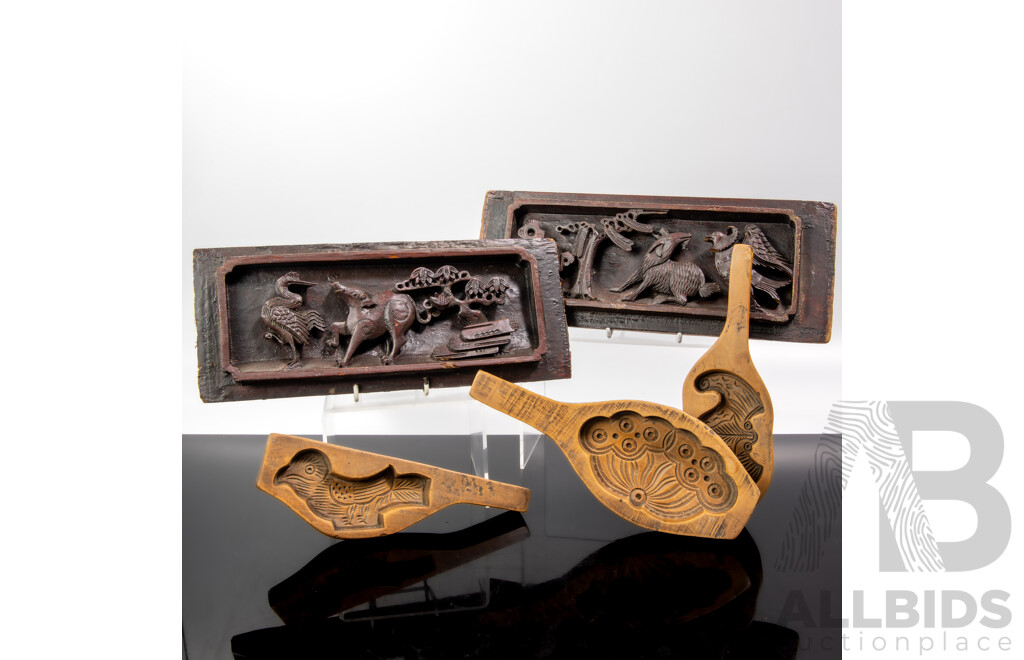 Two Vintage Carved Wooden Chinese Panels Along with Three Vintage Chinese Food Moulds