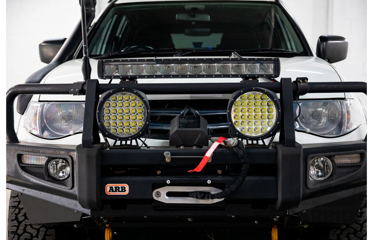 03/2011 Mitsubishi Triton GL-R (4x4) MN MY11 Double Cab Utility Solid White Turbo Diesel 2.5L