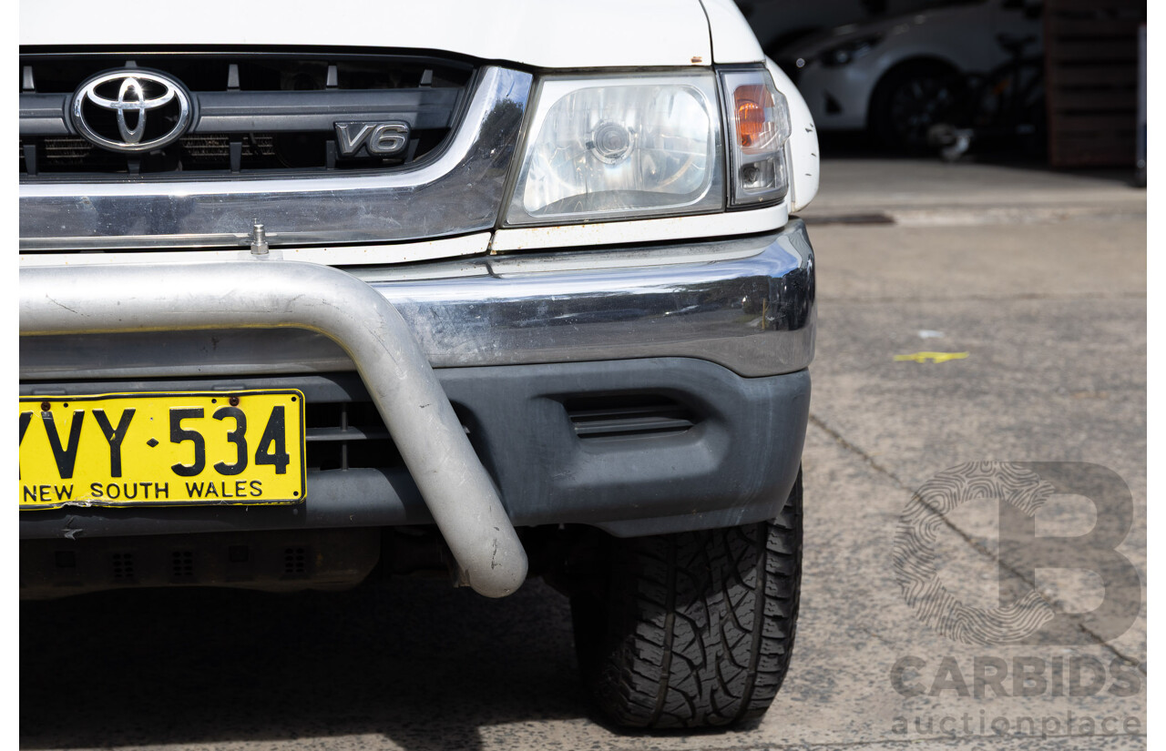 8/2003 Toyota Hilux SR5 (4x4) VZN167R Dual Cab P/Up Vanilla White V6 3.4L