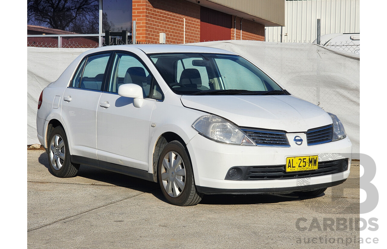 9/2006 Nissan Tiida ST C11 4d Sedan White 1.8L