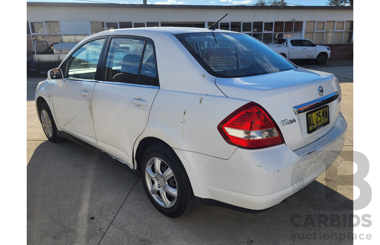 9/2006 Nissan Tiida ST C11 4d Sedan White 1.8L