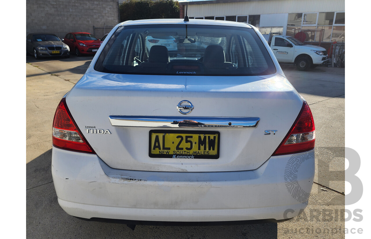 9/2006 Nissan Tiida ST C11 4d Sedan White 1.8L