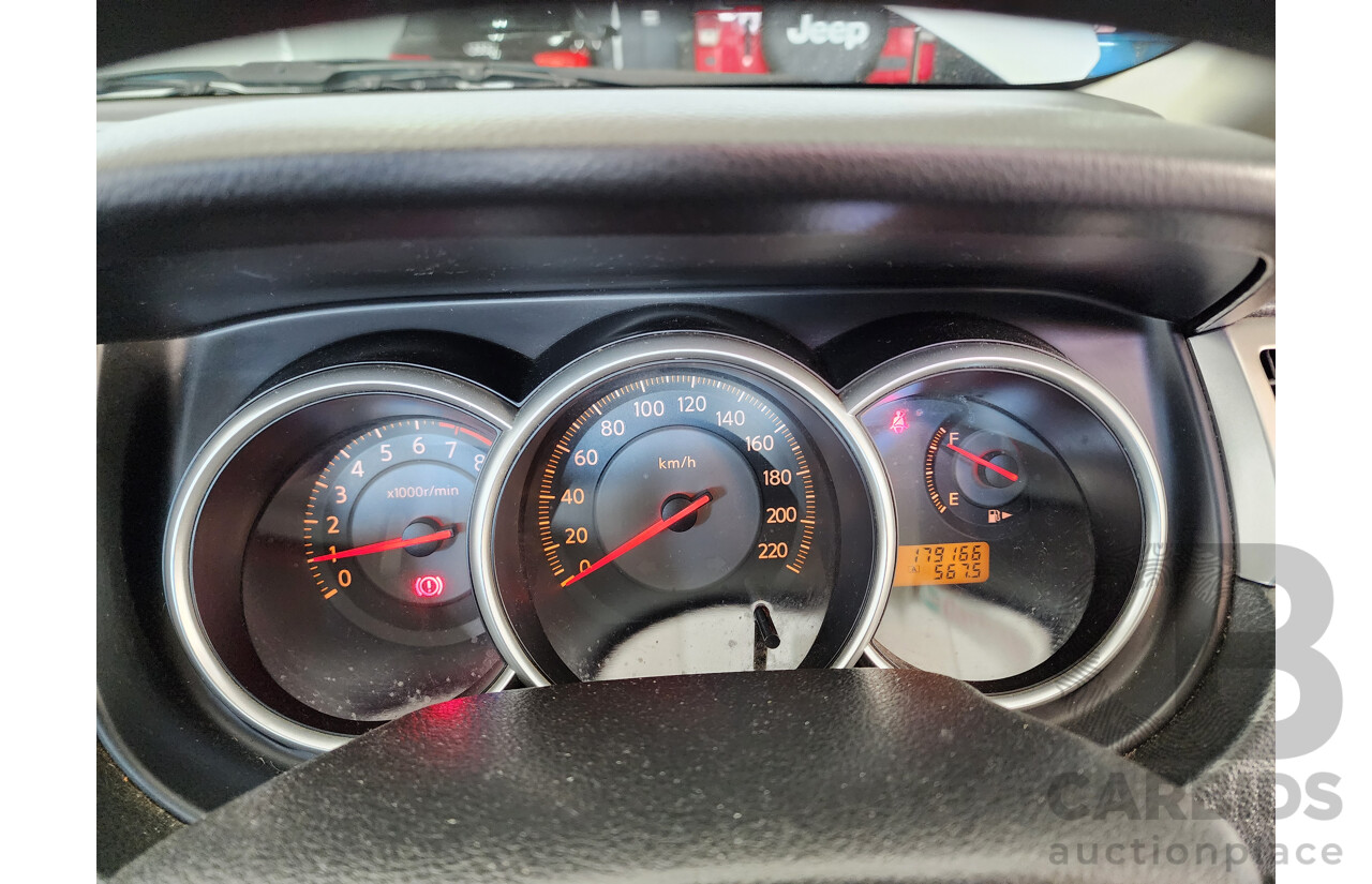 9/2006 Nissan Tiida ST C11 4d Sedan White 1.8L