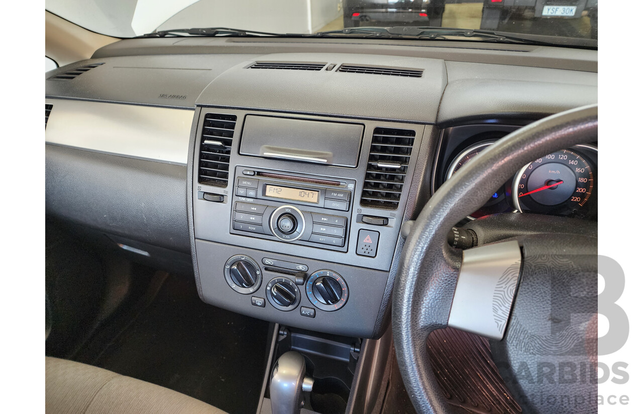 9/2006 Nissan Tiida ST C11 4d Sedan White 1.8L