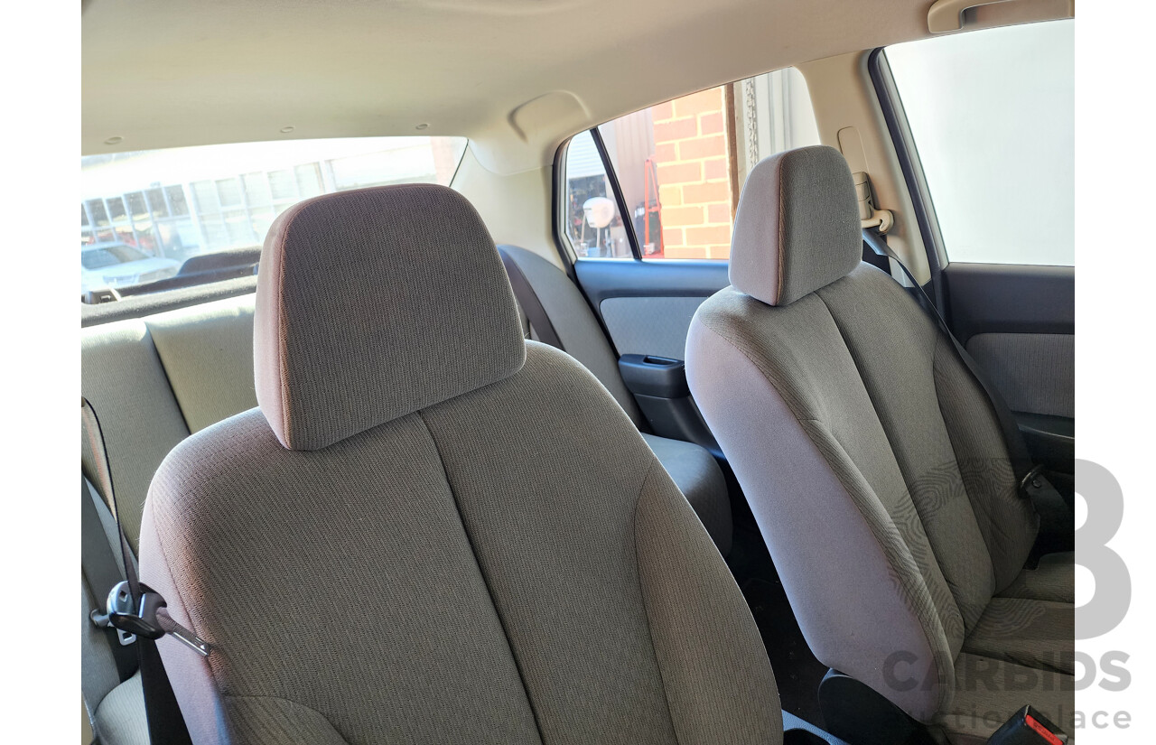 9/2006 Nissan Tiida ST C11 4d Sedan White 1.8L