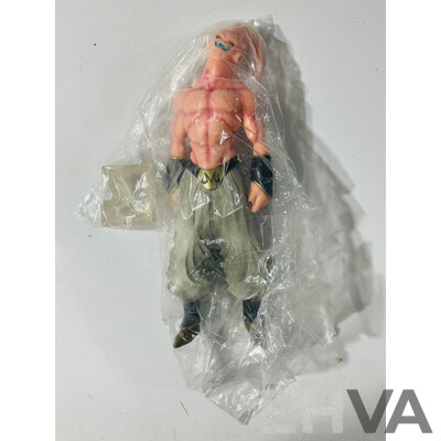 Collection of Three Figures From Different Anime Franchises Including Kakashi From Naruto, Goku and Shenron From Bragonball Z and Majin Buu From Bragon Ball Z