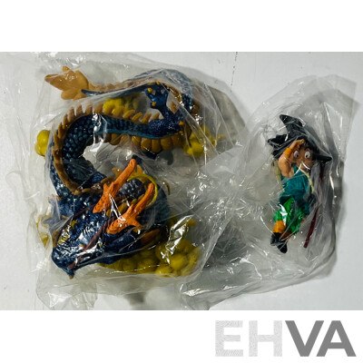 Collection of Three Figures From Different Anime Franchises Including Kakashi From Naruto, Goku and Shenron From Bragonball Z and Majin Buu From Bragon Ball Z