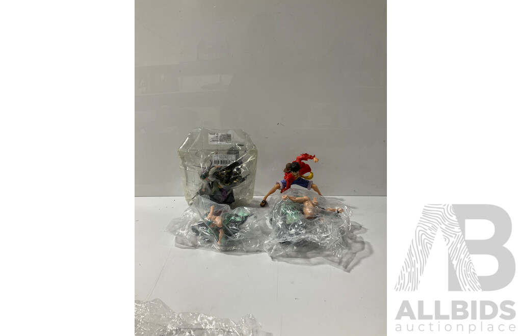 Collection of Four Figures From One Piece Including 17cm Monkey D. Luffy PVC Figure and Three Roranoa Zoro Figures Including 17cm Figure and Two Others