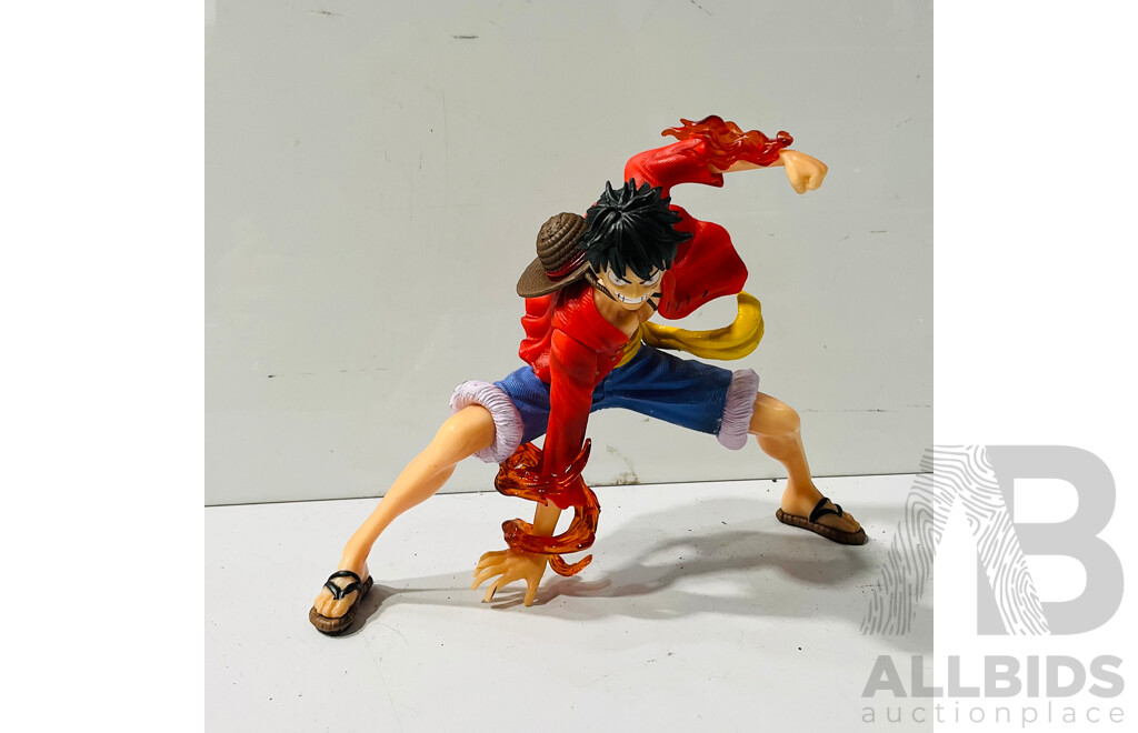 Collection of Four Figures From One Piece Including 17cm Monkey D. Luffy PVC Figure and Three Roranoa Zoro Figures Including 17cm Figure and Two Others