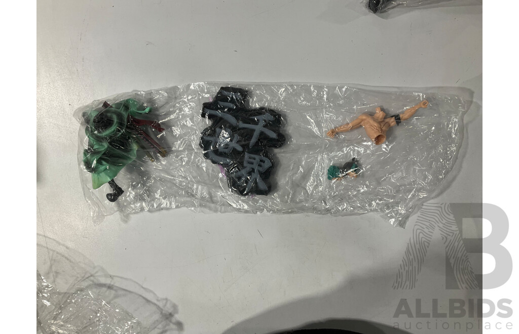 Collection of Four Figures From One Piece Including 17cm Monkey D. Luffy PVC Figure and Three Roranoa Zoro Figures Including 17cm Figure and Two Others