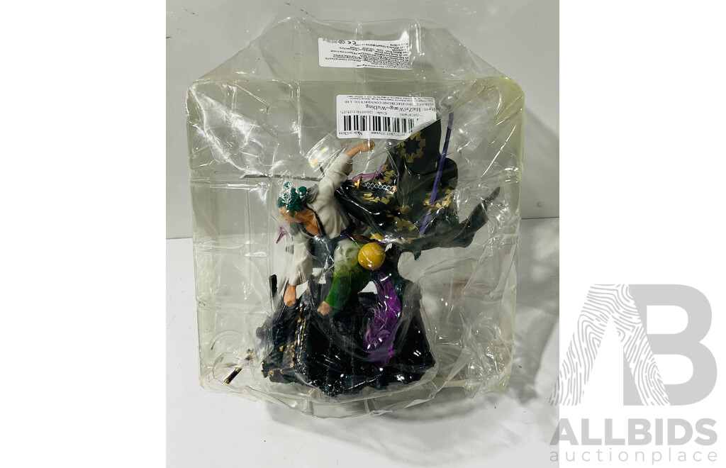 Collection of Four Figures From One Piece Including 17cm Monkey D. Luffy PVC Figure and Three Roranoa Zoro Figures Including 17cm Figure and Two Others
