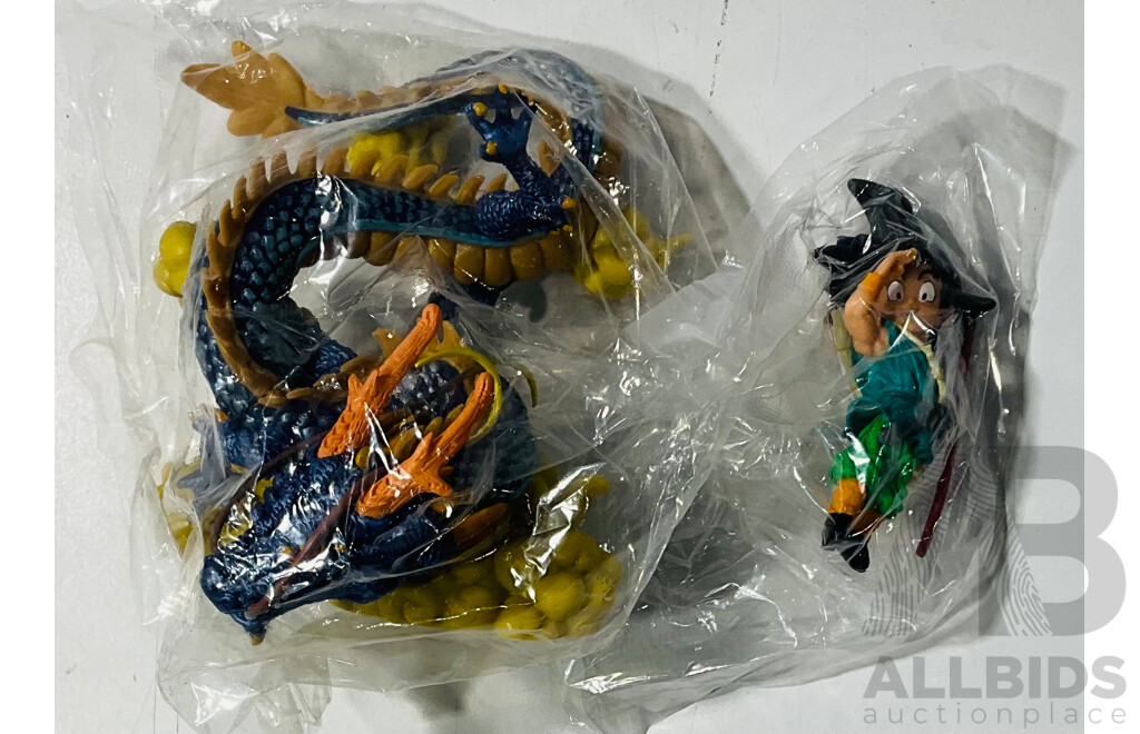 Collection of Three Figures From Different Anime Franchises Including Kakashi From Naruto, Goku and Shenron From Bragonball Z and Majin Buu From Bragon Ball Z