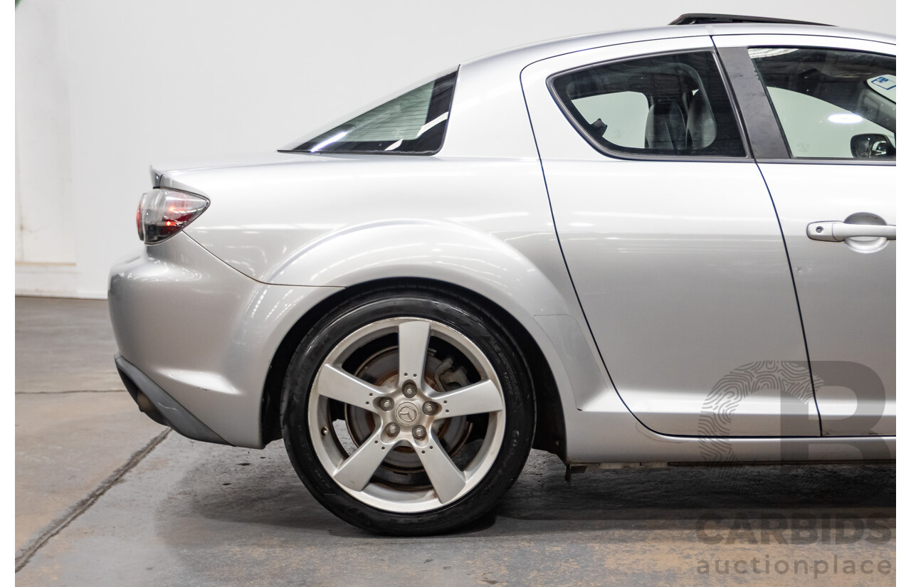 9/2005 Mazda RX-8 FE Series 1 4d Coupe Sunlight Silver Metallic 1.3L
