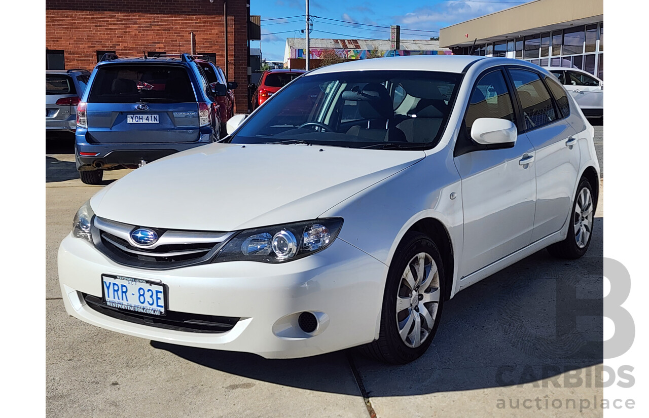 6/2010 Subaru Impreza R (awd) MY10 5d Hatchback White 2.0L