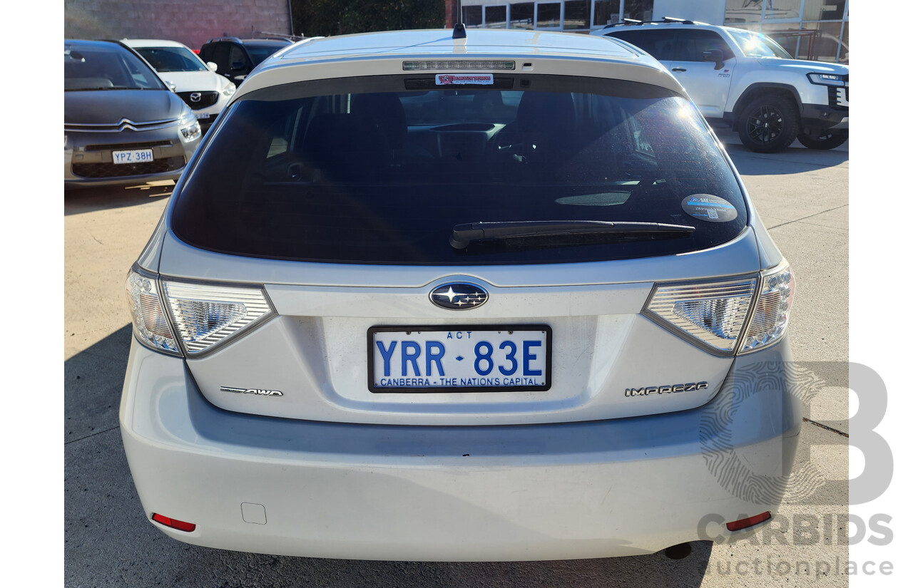 6/2010 Subaru Impreza R (awd) MY10 5d Hatchback White 2.0L