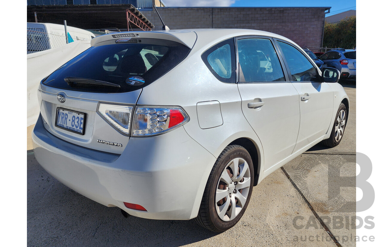 6/2010 Subaru Impreza R (awd) MY10 5d Hatchback White 2.0L