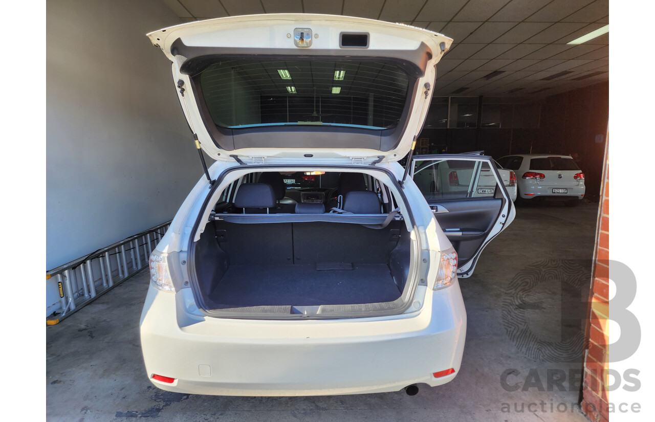 6/2010 Subaru Impreza R (awd) MY10 5d Hatchback White 2.0L