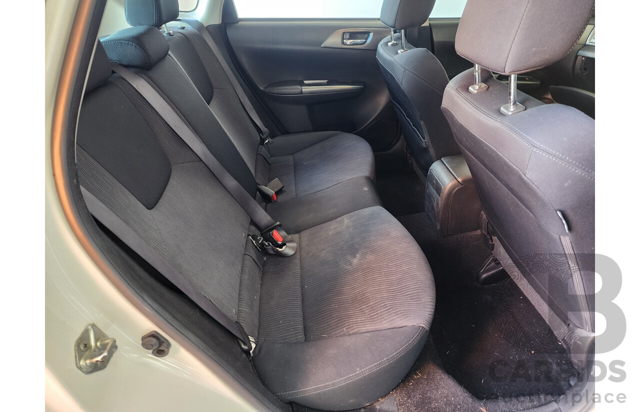 6/2010 Subaru Impreza R (awd) MY10 5d Hatchback White 2.0L