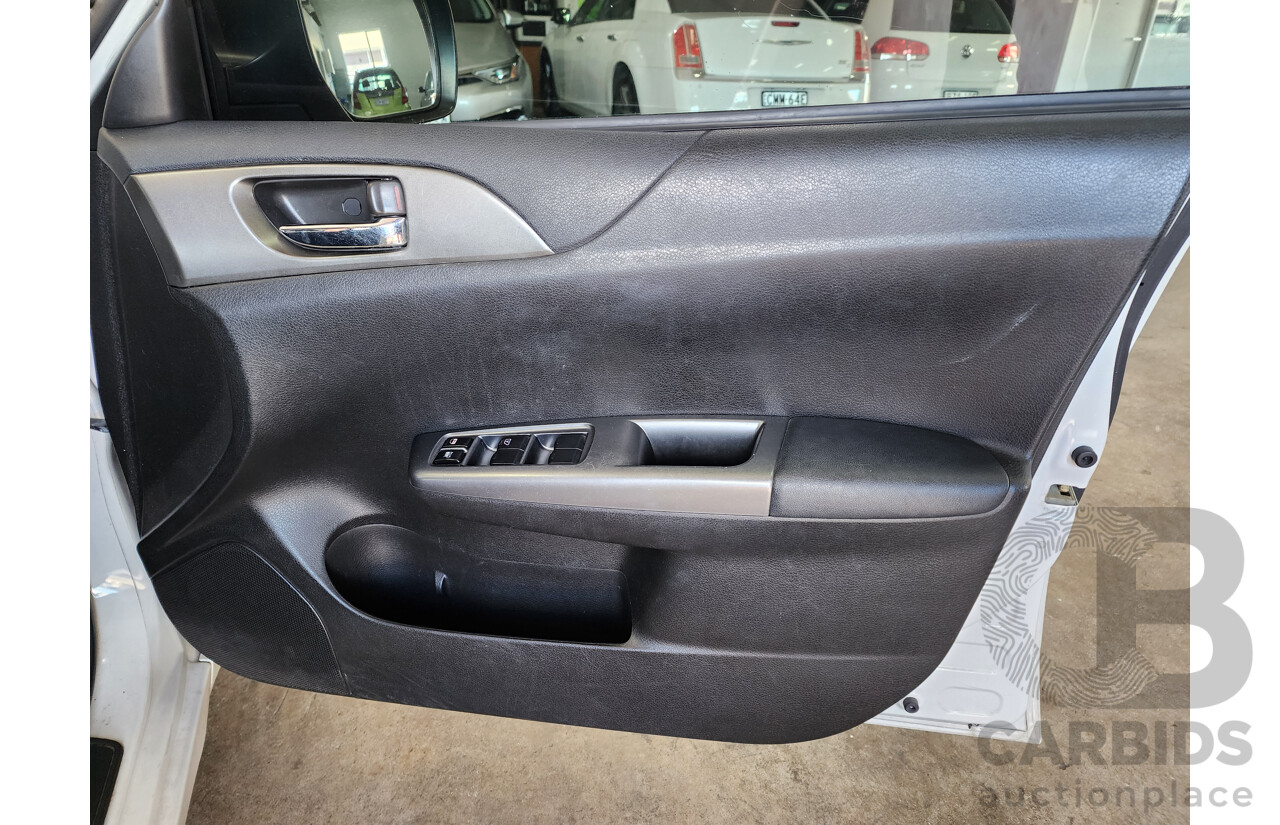 6/2010 Subaru Impreza R (awd) MY10 5d Hatchback White 2.0L