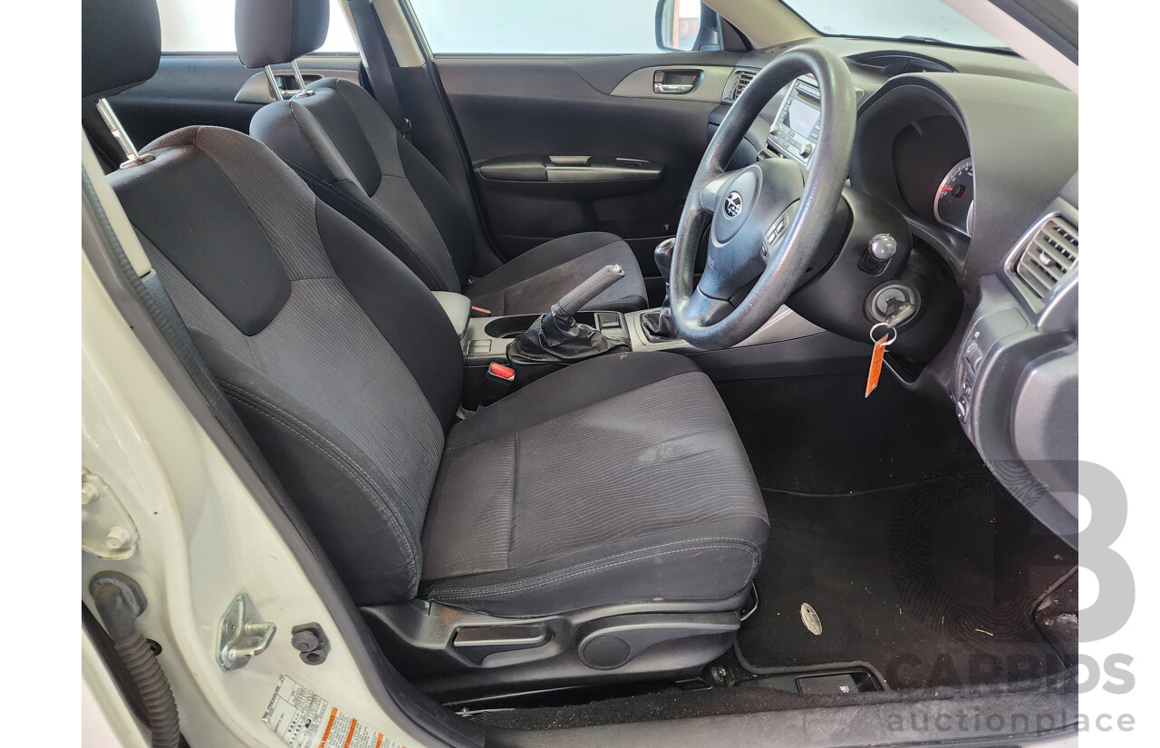 6/2010 Subaru Impreza R (awd) MY10 5d Hatchback White 2.0L