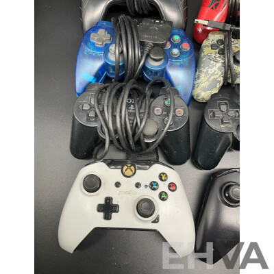Assorted PlayStation and Xbox Consollers - Lot of 8