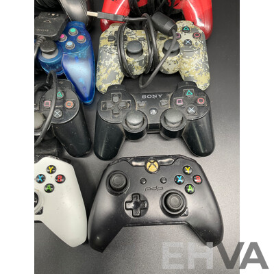 Assorted PlayStation and Xbox Consollers - Lot of 8
