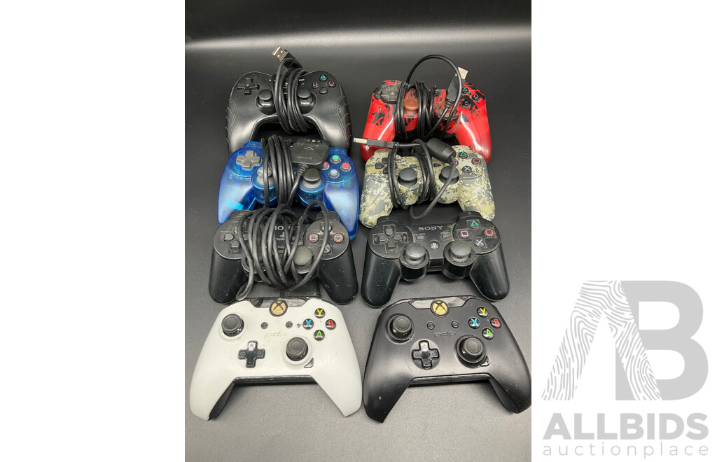 Assorted PlayStation and Xbox Consollers - Lot of 8