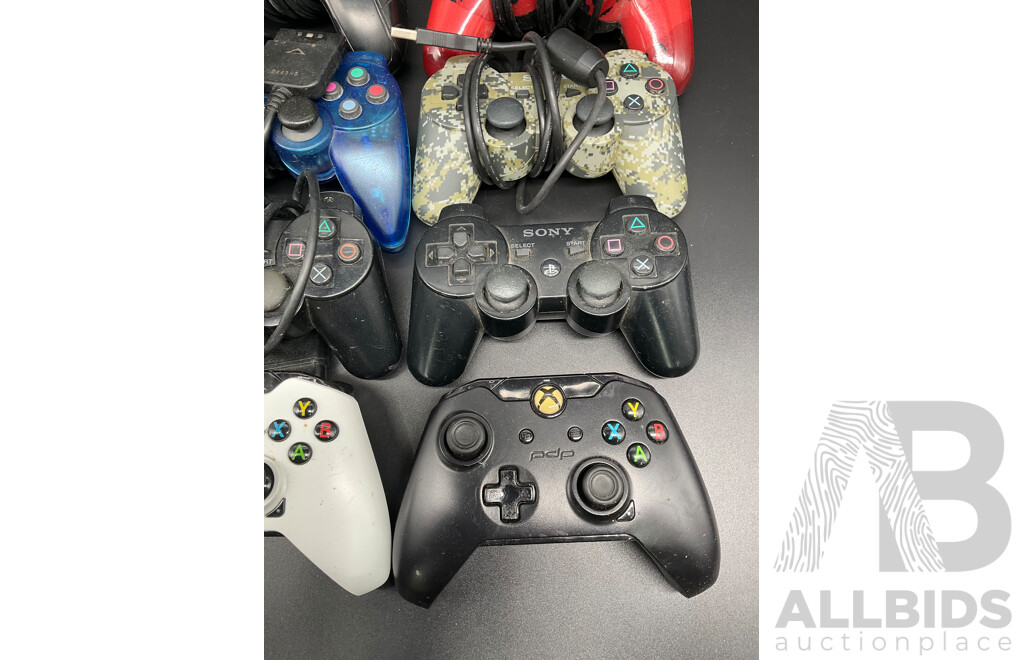 Assorted PlayStation and Xbox Consollers - Lot of 8