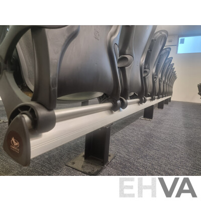 12 Rows of Camatic Theatre Seating on Carpeted Podium