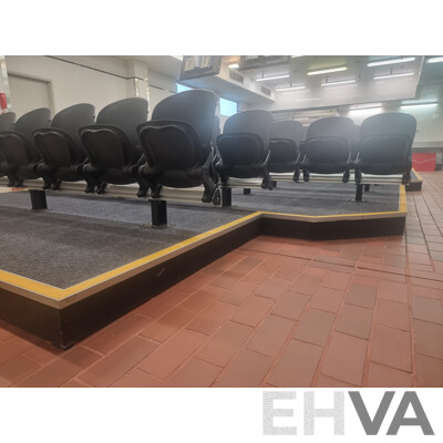 12 Rows of Camatic Theatre Seating on Carpeted Podium