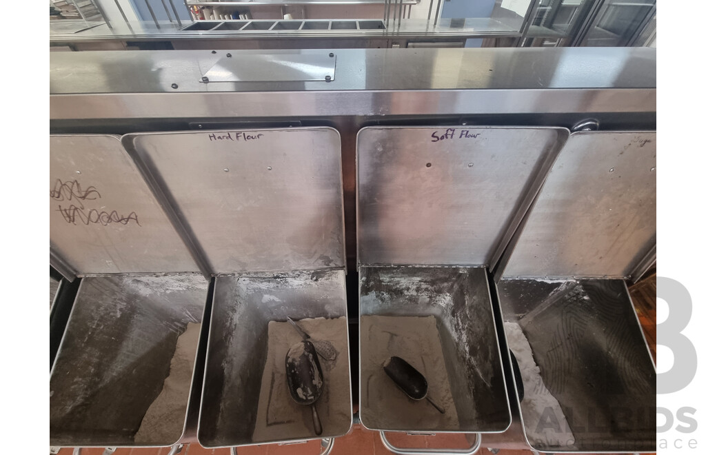 7 Stainless Steel Flour Bins on Wheels