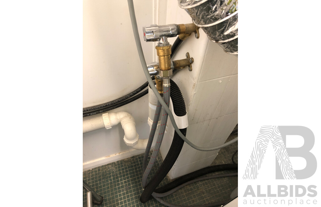 Alliance Laundry Systems Stacked Commercial Washer and Dryer
