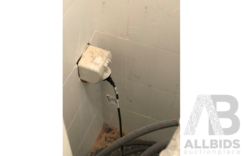 Alliance Laundry Systems Stacked Commercial Washer and Dryer