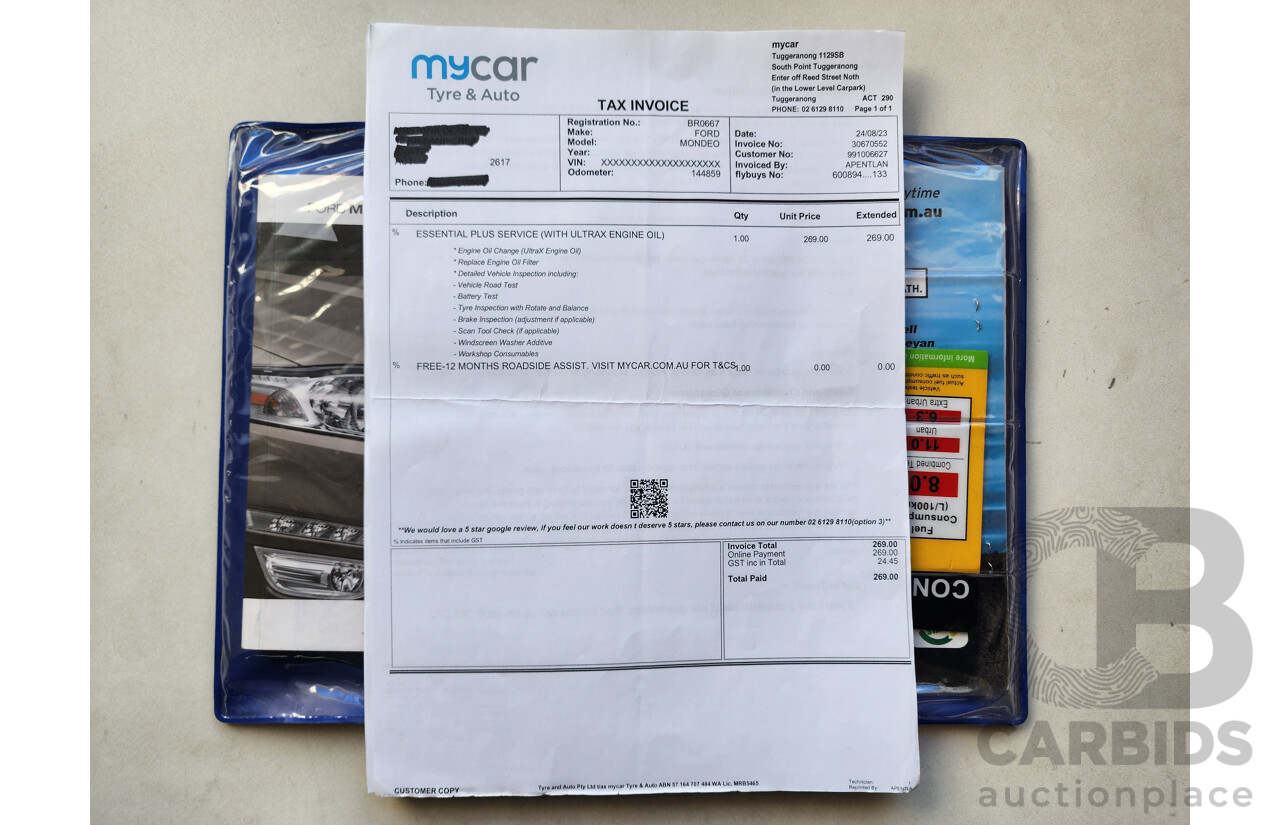 7/2014 Ford Mondeo Zetec MC 5d Hatchback White 2.0L