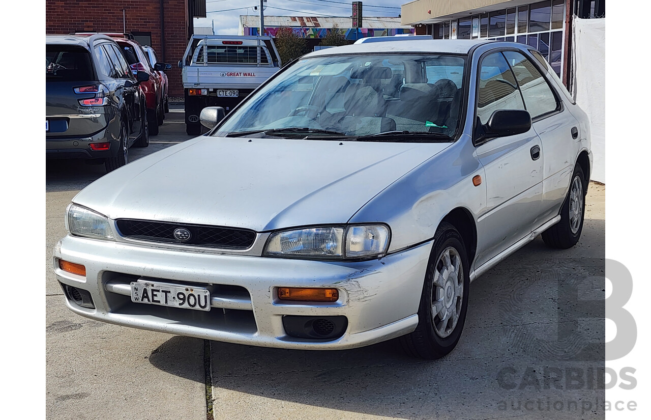6/1997 Subaru Impreza GX  5d Hatchback Silver 2.0L