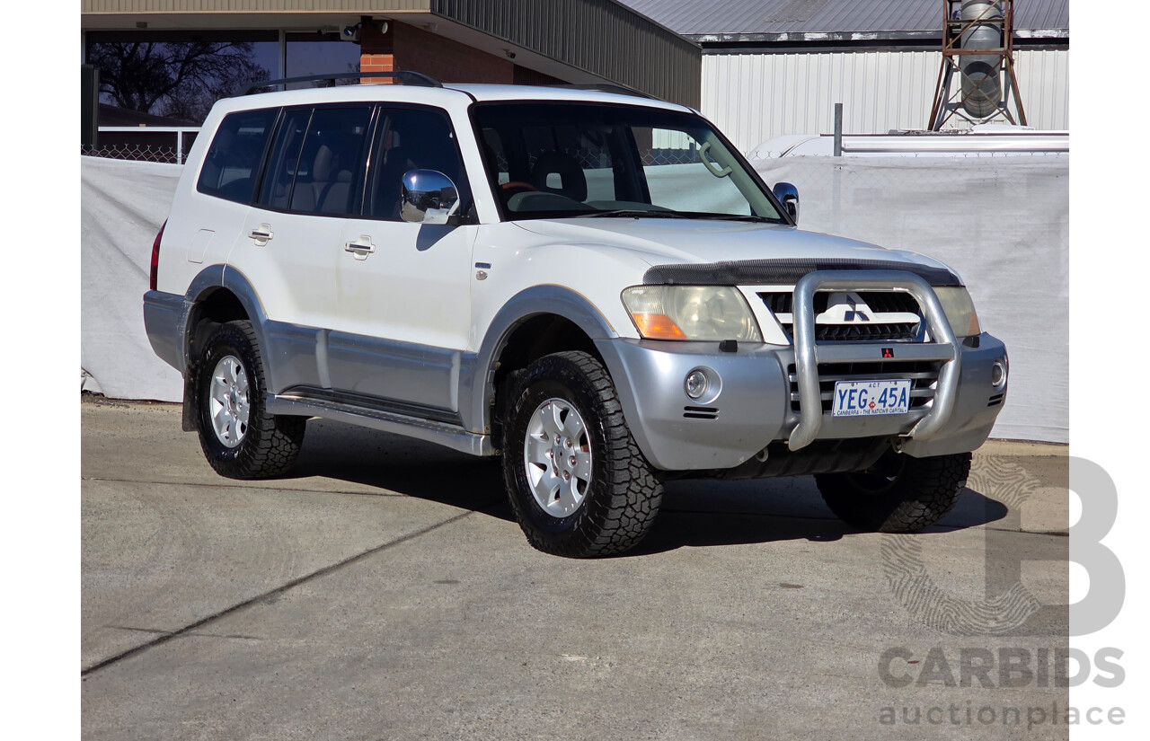 12/2003 Mitsubishi Pajero Exceed LWB (4x4) NP 4d Wagon White 3.8L - 7 Seats Dual Fuel