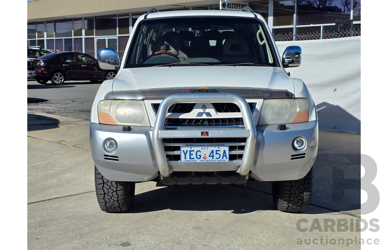 12/2003 Mitsubishi Pajero Exceed LWB (4x4) NP 4d Wagon White 3.8L - 7 Seats Dual Fuel