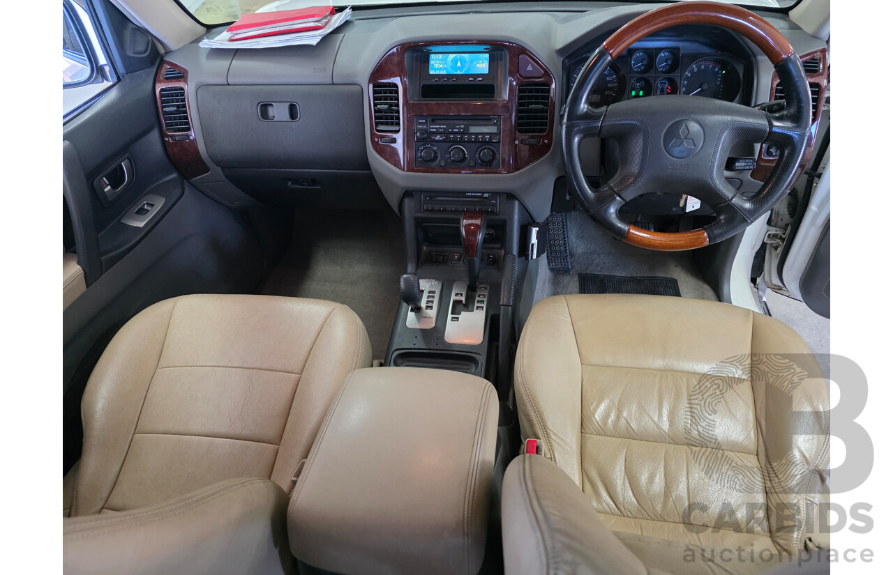 12/2003 Mitsubishi Pajero Exceed LWB (4x4) NP 4d Wagon White 3.8L - 7 Seats Dual Fuel