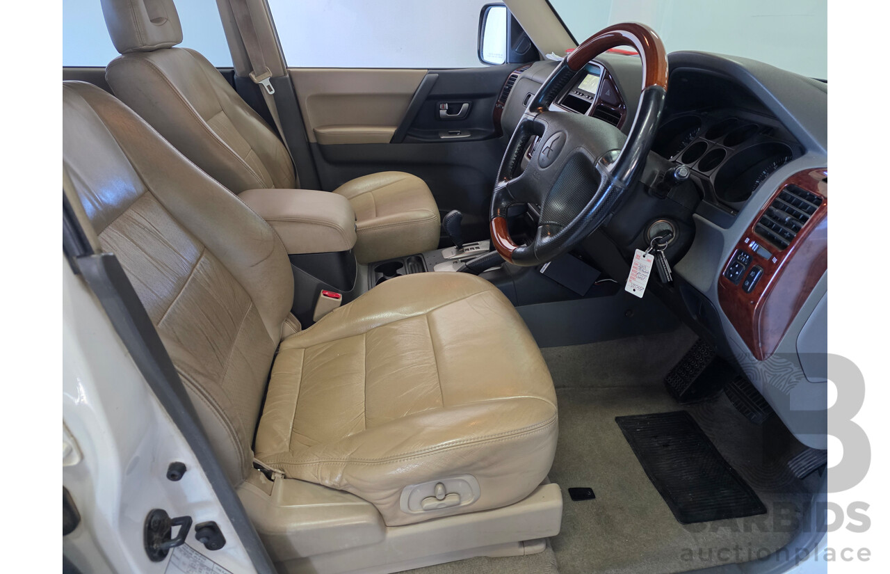 12/2003 Mitsubishi Pajero Exceed LWB (4x4) NP 4d Wagon White 3.8L - 7 Seats Dual Fuel
