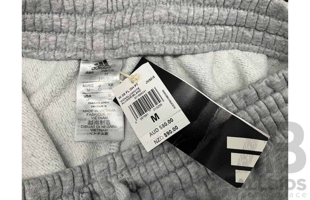NORTH FACE Cropped Puffer Jacket and ADIDAS Truck Pants - Lot of 2