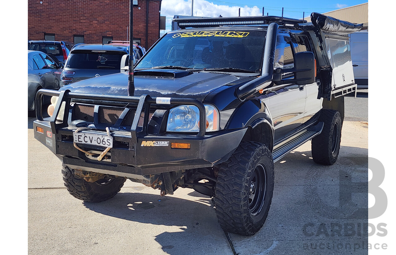 11/2009 Nissan Navara ST-R (4x4) D22 MY08 Dual Cab P/Up Black 2.5L