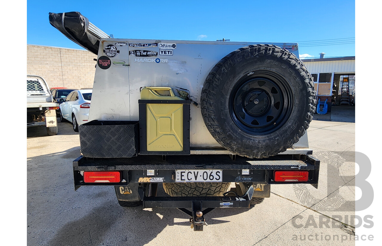 11/2009 Nissan Navara ST-R (4x4) D22 MY08 Dual Cab P/Up Black 2.5L