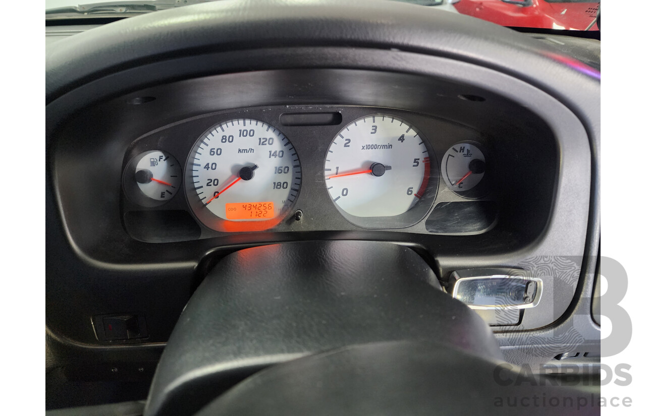 11/2009 Nissan Navara ST-R (4x4) D22 MY08 Dual Cab P/Up Black 2.5L