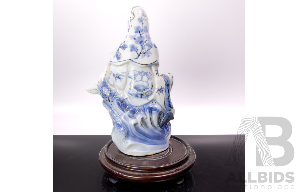 Vintage Chinese Hand Painted Porcelain Guan Yin Riding Koi with Child Figure on Lotus Base with Gilt Highlights on Wooden Base