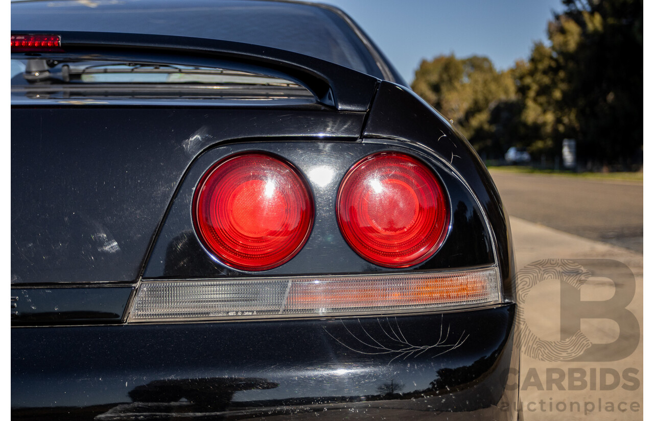 1993 - COMP 10/2002 Nissan Skyline R33 GTS25T ECR33 Series 1 2d Coupe KH3 Super Black Turbo 2.5L -  Import