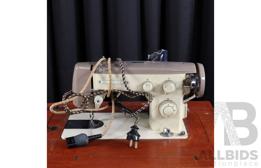 Retro Empisal Sewing Machine in Fold Over Cabinet