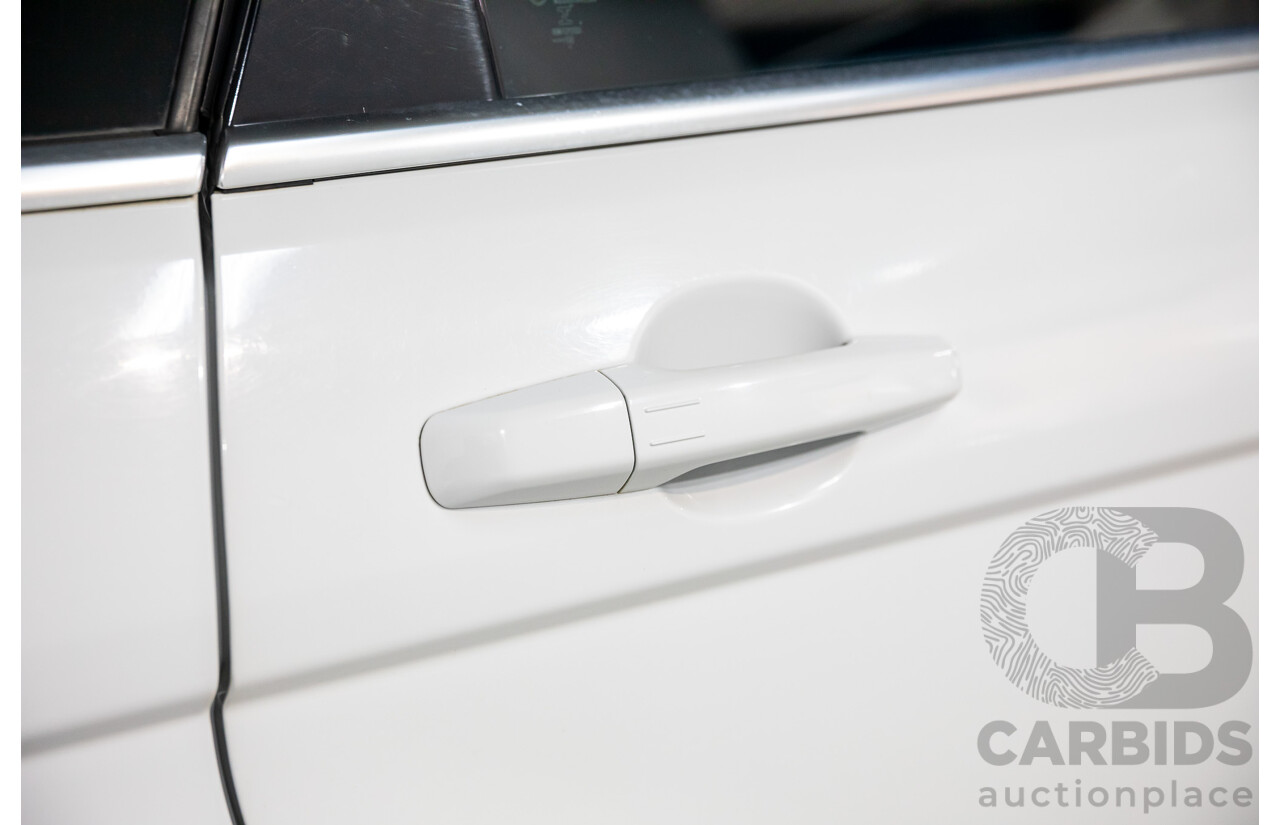 07/2013 Range Rover Evoque Si4 Prestige (AWD) MY13.5 LV 5d Wagon Fuji White/Santorini Black Turbo 2.0L
