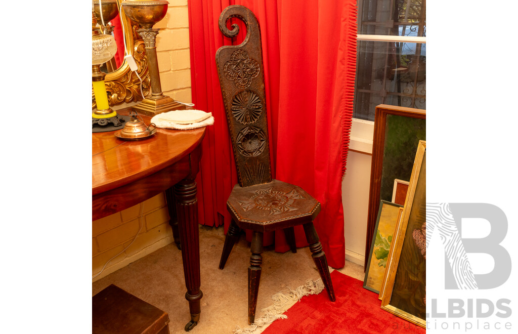 Heavily Carved Timber Spinning Chair