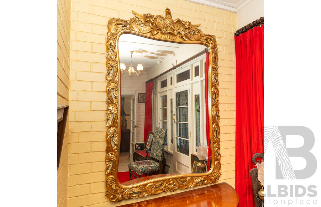 Large Composite Gilt Framed Mirror with Soaring Eagle to Top
